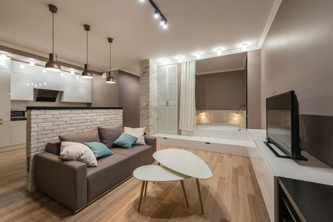 Какие задачи решает дизайн компактной квартиры в центре?